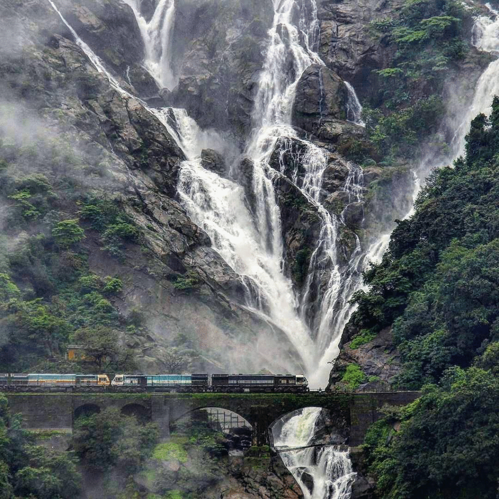 Dudhsagar Waterfall beside railway tracks during monsoon in Goa
