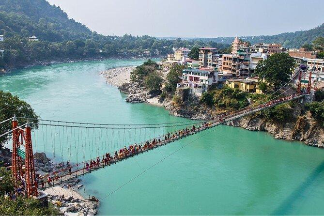 Ram Jhula suspension bridge over the Ganga River in Rishikesh