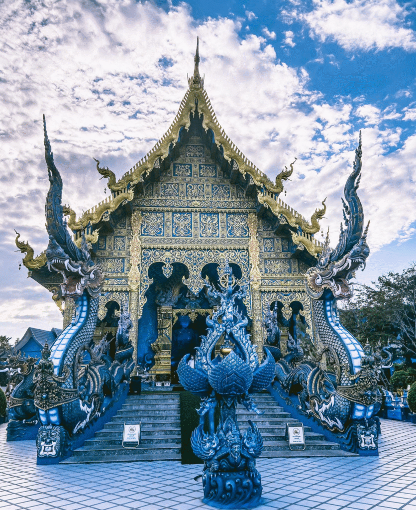 Blue Temple Wat Rong Suea Ten Chiang Rai with gold and cerulean facade
